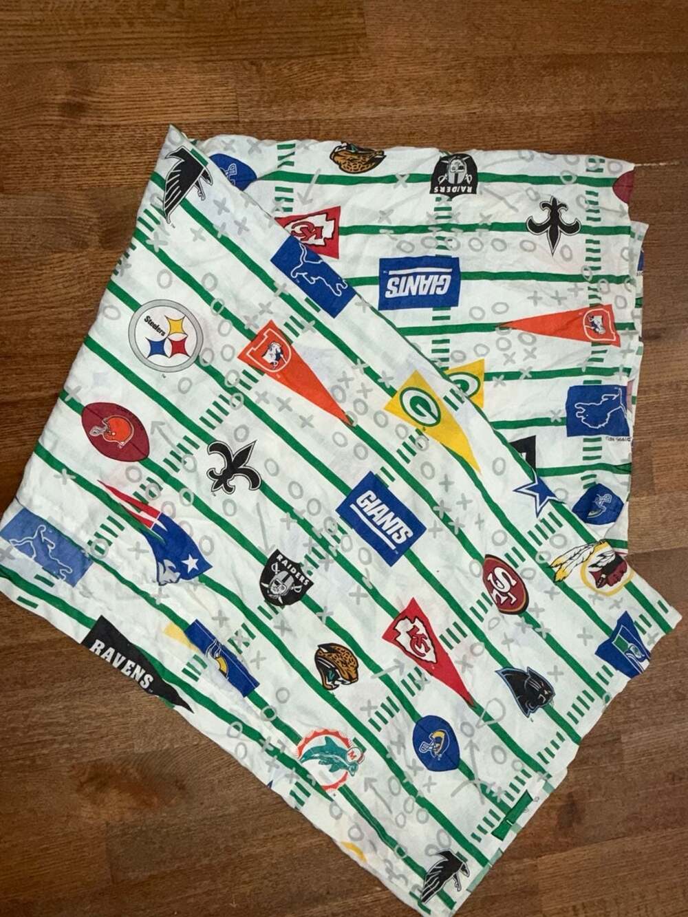 NFL All Teams Logos Twin Flat Sheet by The Bibb Company